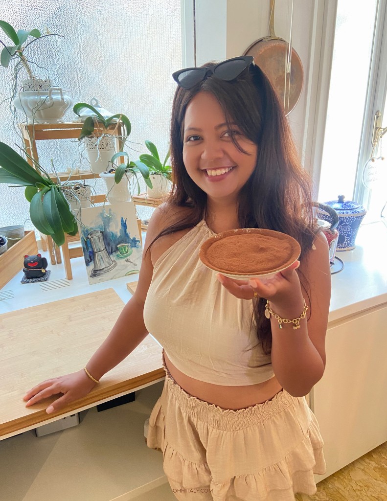 Melanie presenting a freshly prepared tiramisu