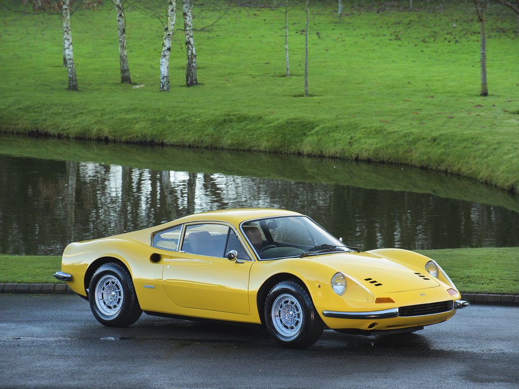 Classic yellow Ferrari Dino, a real Italian performance icon for the Chianti road chapter