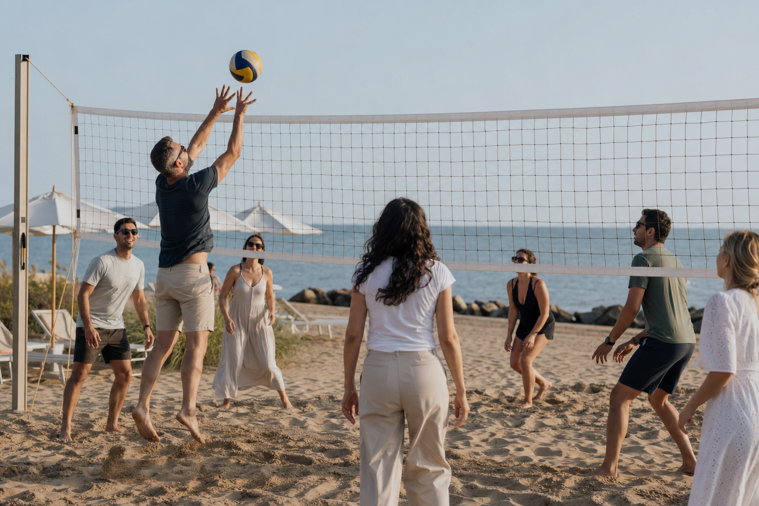 Beach volleyball moment during a corporate incentive retreat near Jesolo