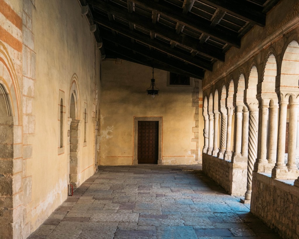 Follina Abbey cloister arches and stone floor