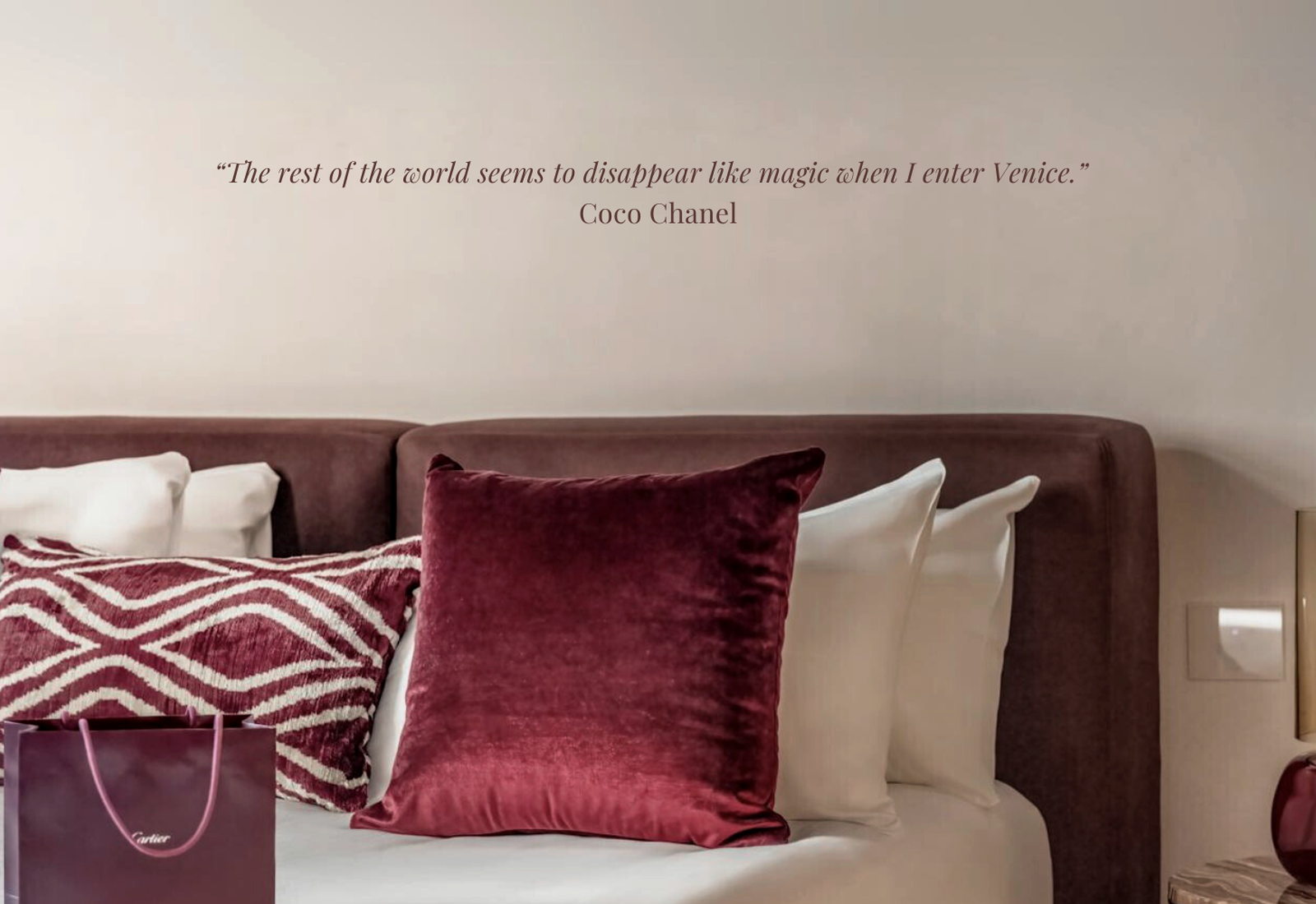 Quiet bedroom detail with Coco Chanel quote at Palazzo Garzoni