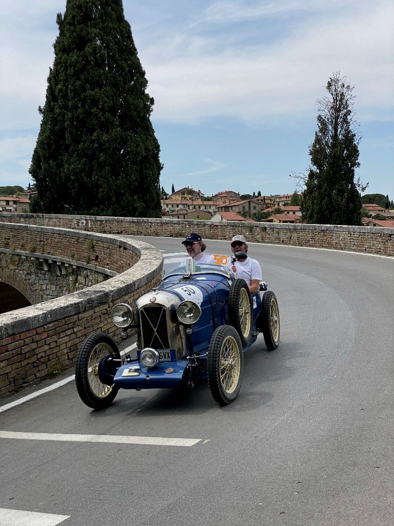 Vintage roadster on a Mille Miglia bend in Tuscany - OHH! Italy