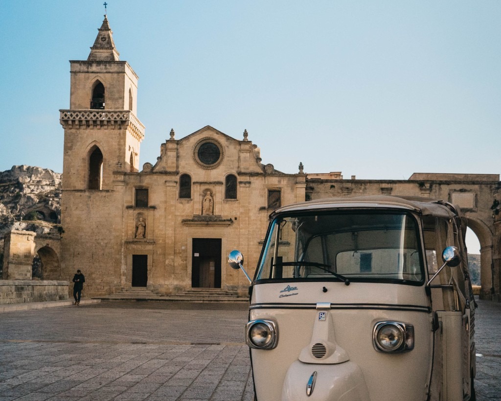 Ape Calessino in front of Matera cathedral square