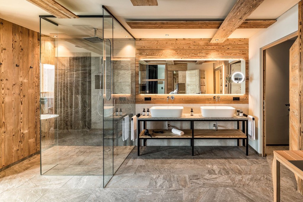Treetop Suite bathroom · timber, stone and walk-in shower