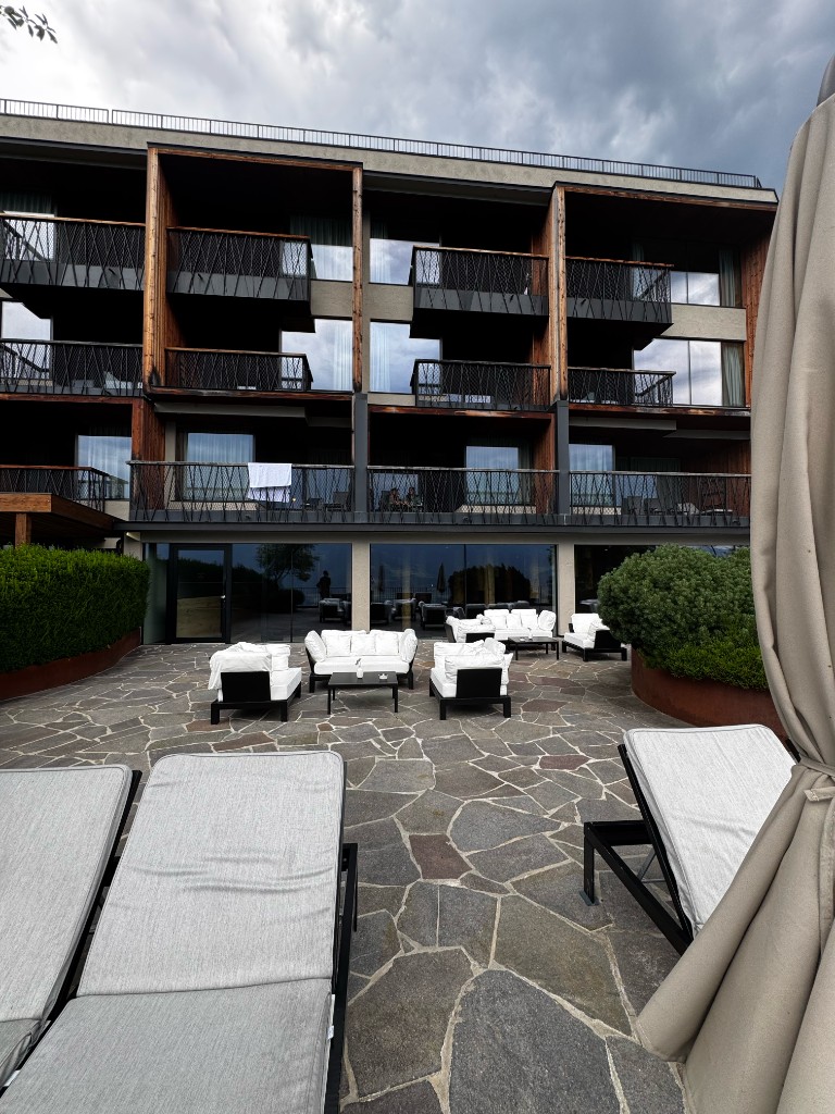 Suite balconies and stone terrace · outdoor lounge