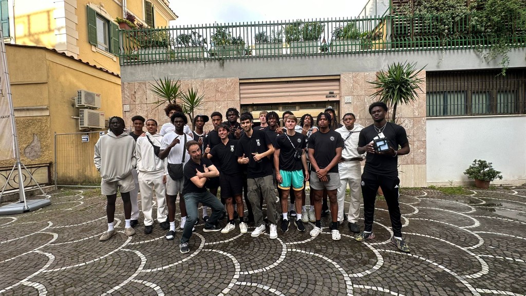 Private group portrait in a Roman courtyard during a private OHH! Italy journey