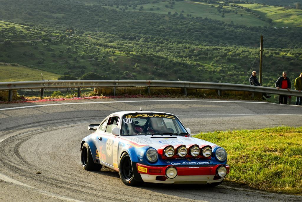 Classic Porsche 911 on a Targa Florio mountain curve in Sicily