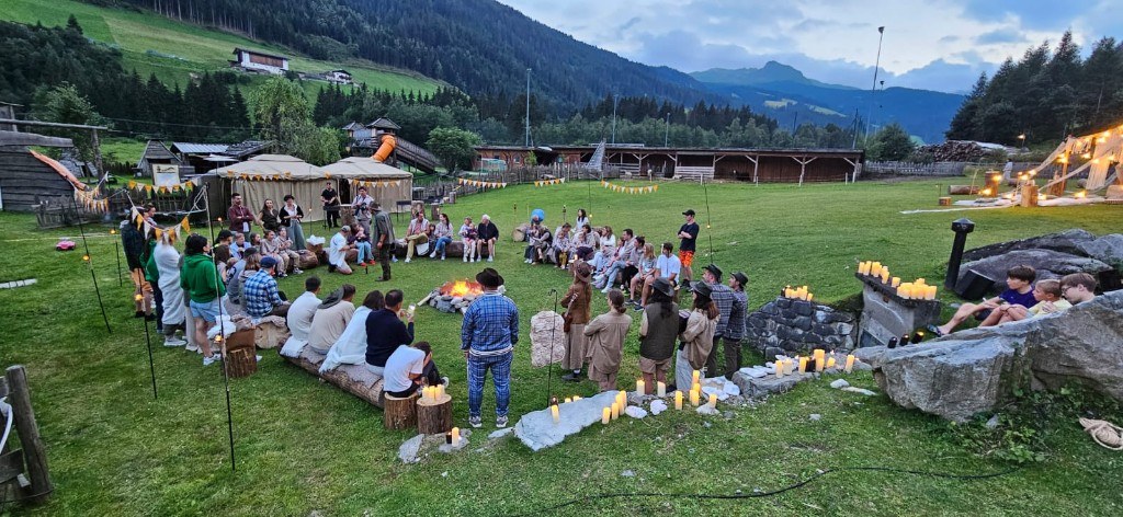 Camp fire circle with the full group · 2024