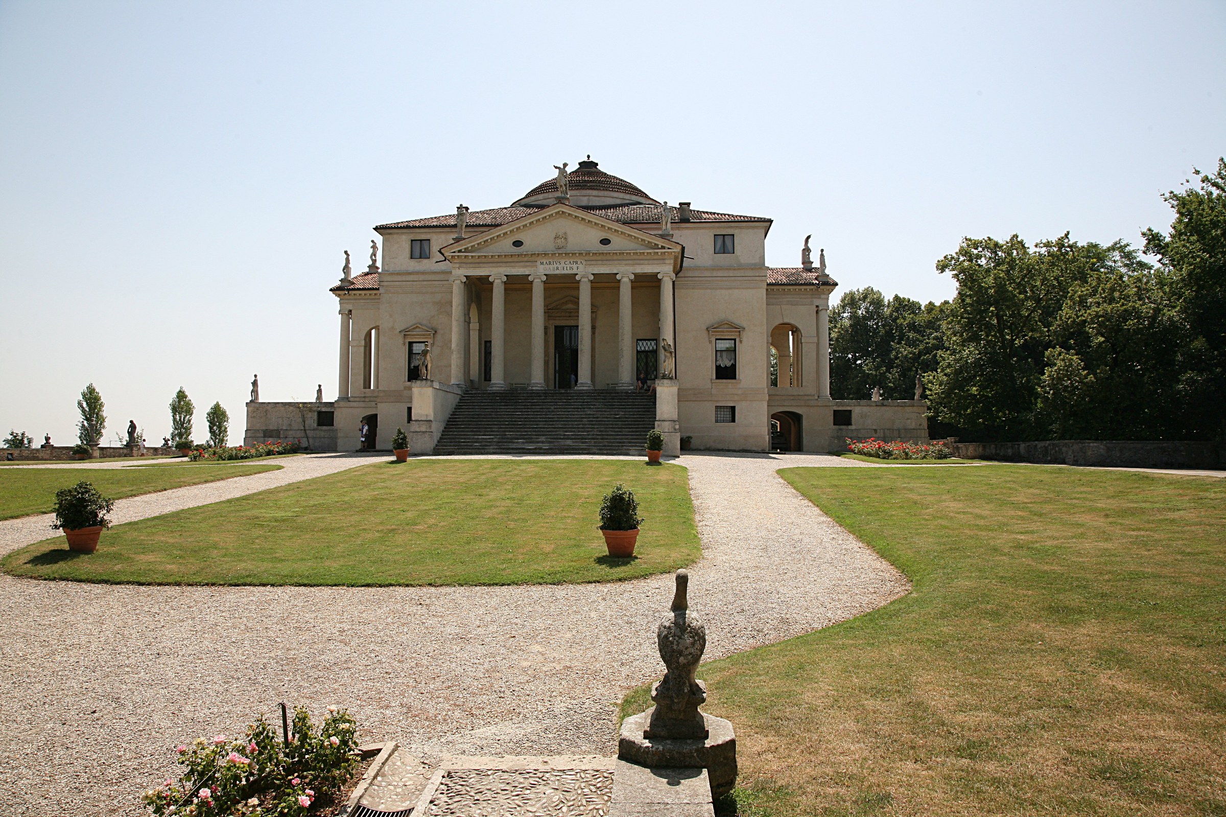 La Rotonda in its hilltop landscape: axial lawn, stair, hexastyle portico and dome