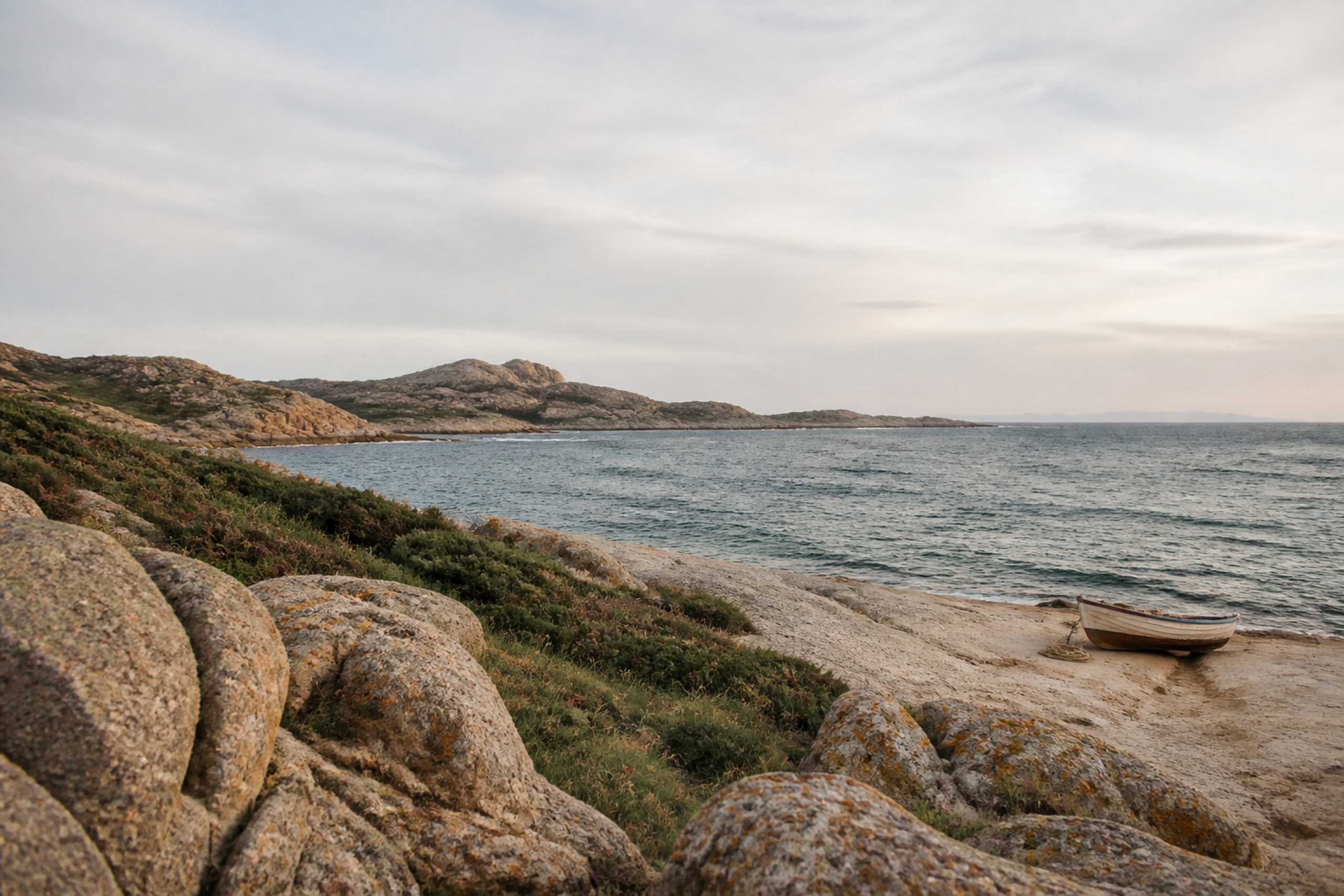 Granite coastline and Mediterranean scrub beside the sea in Sardinia