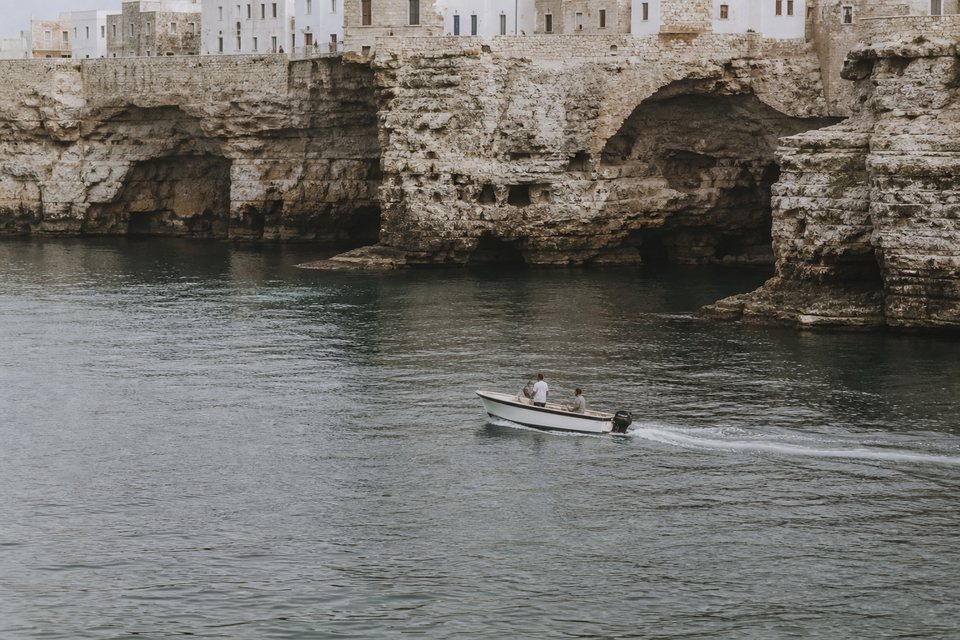 Small private motorboat along the limestone Adriatic coast of Puglia, OHH! ITALY