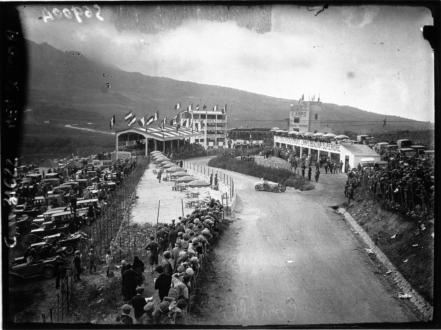 Historic Floriopoli pits and grandstand during the Targa Florio with Conelli arriving for refuelling - OHH! Italy Journal