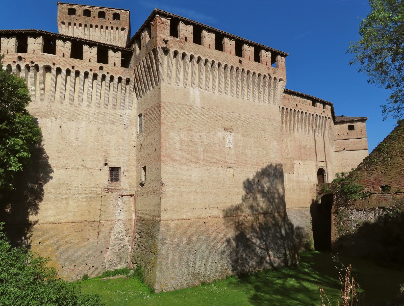 Brick keep and southwest wing of the castle at Montechiarugolo, Emilia-Romagna, OHH! ITALY