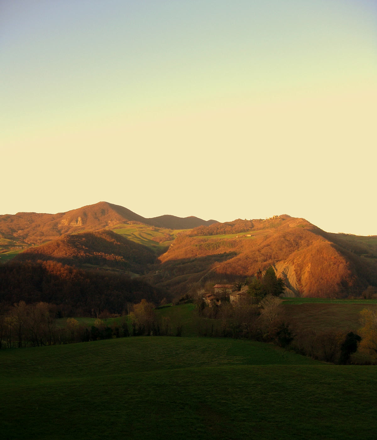 Hills of the Val Tidone at dusk, the Piacentino landscape that holds Rocca d’Olgisio, Emilia-Romagna, OHH! ITALY