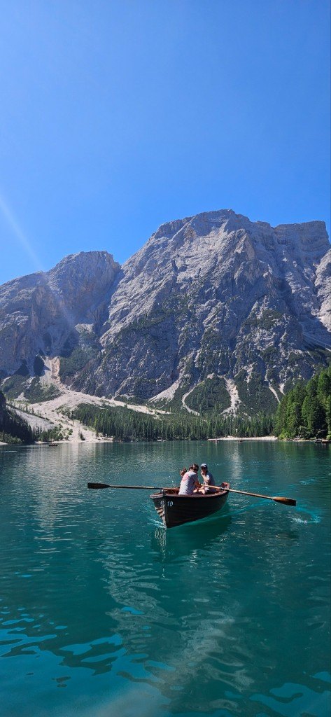 Wooden boat on Lago di Braies during Summer Camp 2025