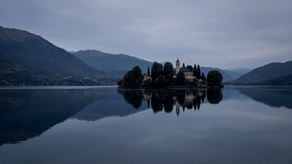 Still blue-hour view of Lake Orta with Isola San Giulio, Piedmont, OHH! ITALY
