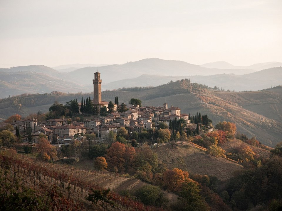 Barbaresco tower above the Tanaro valley landscape, Piedmont, OHH! ITALY