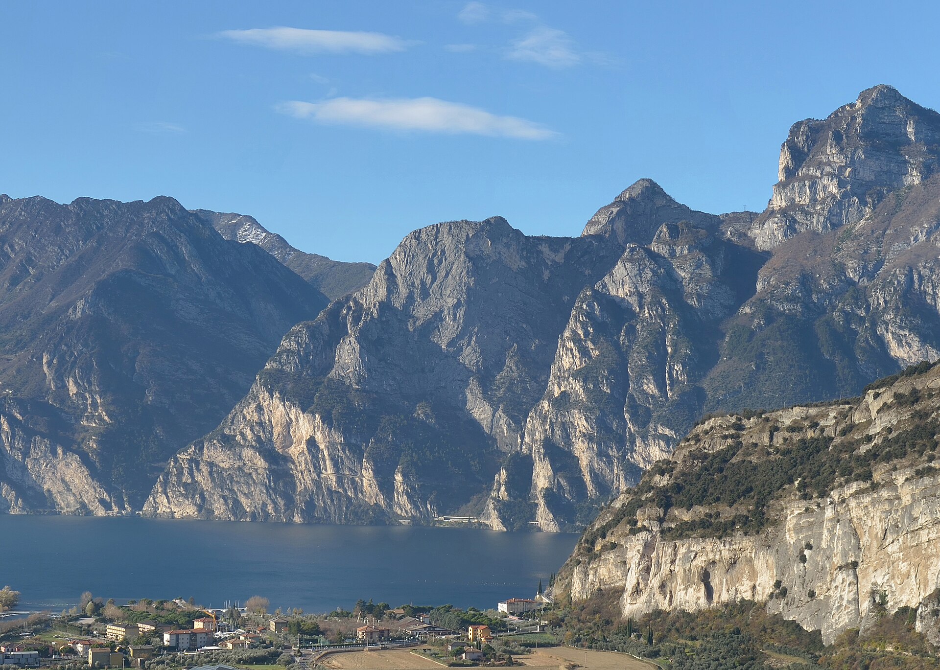 Northern Lake Garda below limestone peaks, the shoreline toward Riva and Torbole
